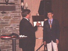 Cole faces magician 240x180.jpg (12943 bytes)