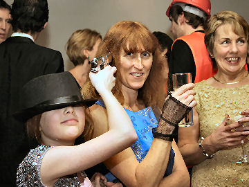 Luki holds a gun to her mother's head, as usual