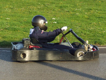 George passes the grandstand
