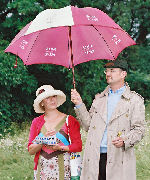 Caroline lends Ian her corporate accessory