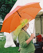 Hazel goes for orange to complement her green outfit