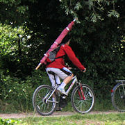 LMBC flag being carried upriver on a bike with high expectations...