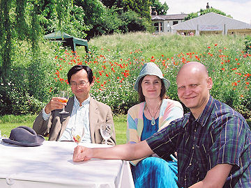 Gordon Woo with Alison and Chris Martin