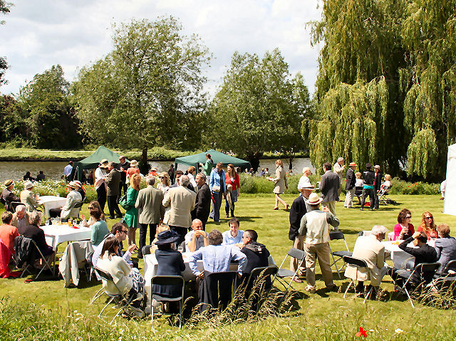 Party-goers on the riverbank