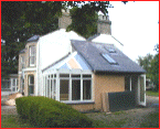 Roof done and conservatory glazing in place.